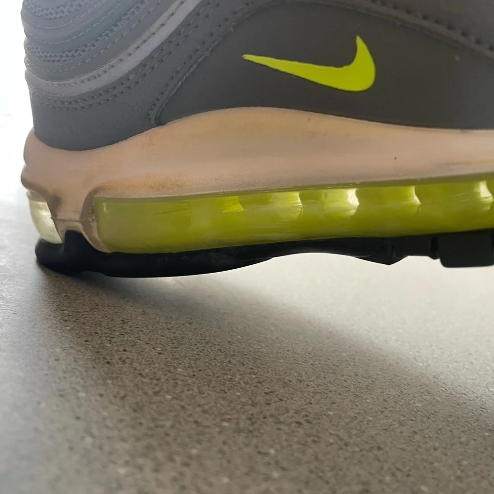 Preloved. Size 5 youth Nike fluorescent swish sneakers.